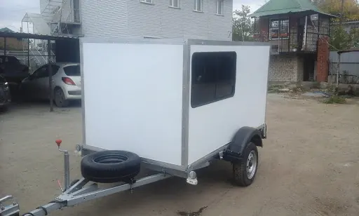 Фургон на легковом прицепе для охоты и рыбалки